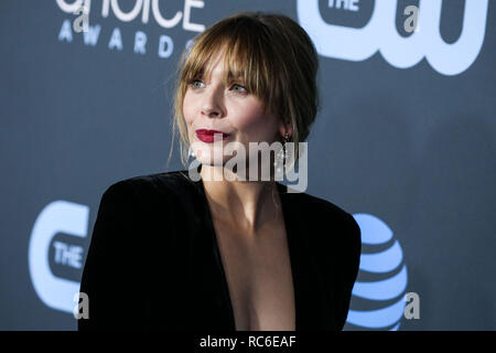 Santa Monica, United States. 13th Jan, 2019. Actress Elizabeth Olsen wearing a Alexandre Vauthier dress, Christian Louboutin shoes, and Beladora earrings arrives at the 24th Annual Critics' Choice Awards held at the Barker Hangar on January 13, 2019 in Santa Monica, Los Angeles, California, United States. (Photo by Xavier Collin/Image Press Agency) Credit: Image Press Agency/Alamy Live News Stock Photo