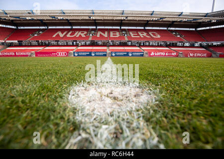 17 December 2018, Bavaria, Nürnberg: View of the kick-off point on the lawn in the middle circle of the Max Morlock Stadium towards the grandstand. Photo: Daniel Karmann/dpa Stock Photo