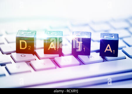 Letter cubes forming the word data on a computer keyboard Stock Photo