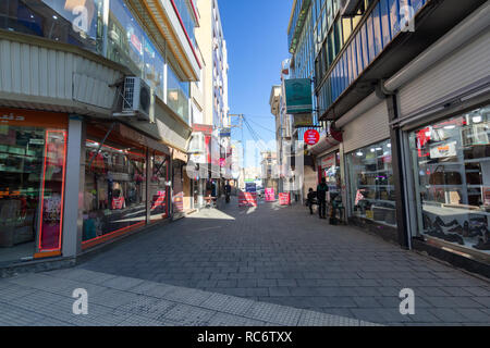 Cobblestone pavement, Khayyam street, The pavement shops, West Azerbaijan province, Urmia, Iran Stock Photo