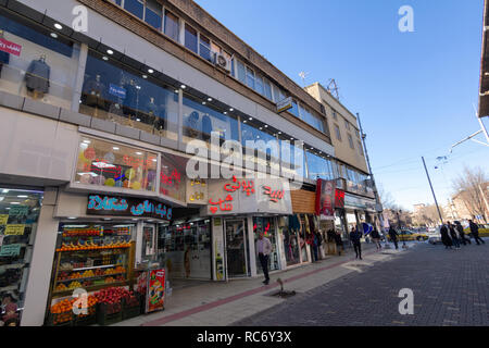 Cobblestone pavement, Khayyam street, The pavement shops, West Azerbaijan province, Urmia, Iran Stock Photo