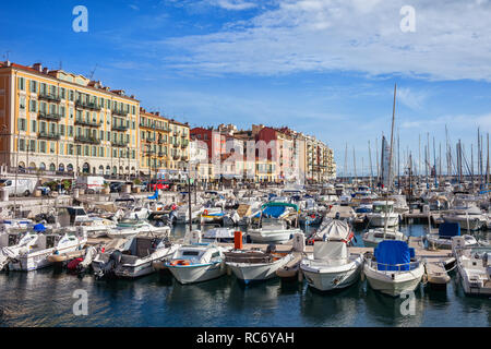 France, Port Lympia in city of Nice, apartment buildings, motorboats, yachts and sailing boats on French Riviera - Cote d'Azur sea bay Stock Photo