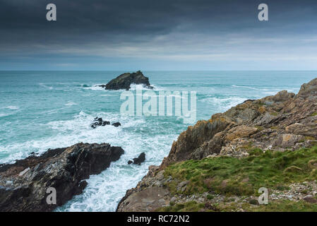 The Goose a small rocky uninhabited island off the coast of Pentire Point East in Newquay Cornwall. Stock Photo