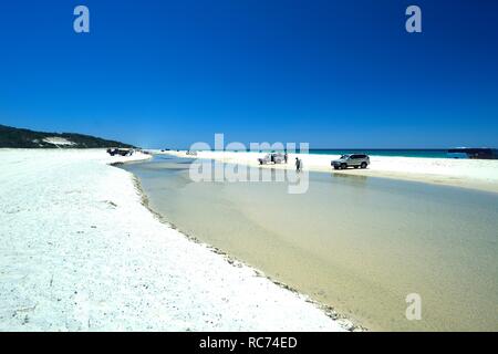 Parked 4x4 vehicles at Eli Creek on Fraser Island, Australia Stock Photo