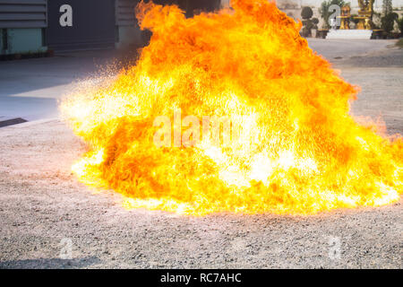 The flame from the oil that rises violently In the fire drill Stock Photo