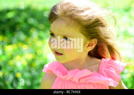 Spring is in my heart. Summer girl fashion. Happy childhood. Springtime. weather forecast. face skincare. allergy to flowers. Small child. Natural beauty. Childrens day. Little girl in sunny spring Stock Photo