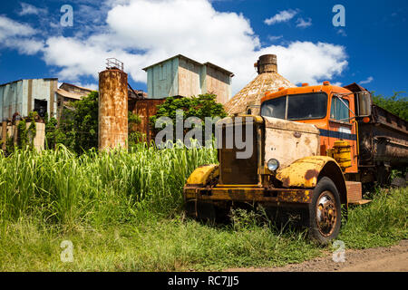 Rusty truck in front of Old Koloa Sugar Mill, Kauai, Hawaii Stock Photo