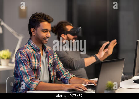 creative man with laptop working at office Stock Photo