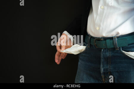 Businessman has no money. Unemployed and bankrupt man looks into his empty pockets. Stress crisis, unemployed businessmen waiting for new job Stock Photo