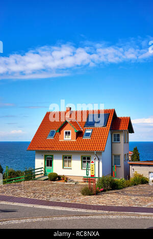 Cottage on the Baltic Sea. Living in Lohme on the island of Rügen. - Letters with FEWO Means holiday apartment. Stock Photo