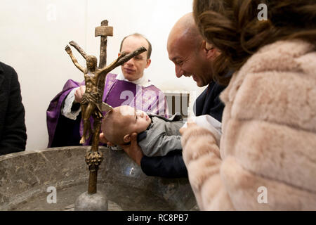 Christening of a baby boy in a Catholic church, Sicily Italy Stock Photo