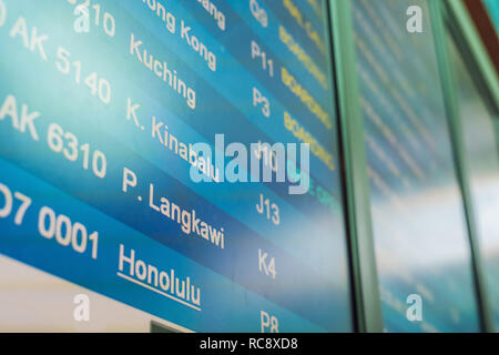 info of flight on billboard in airport Stock Photo