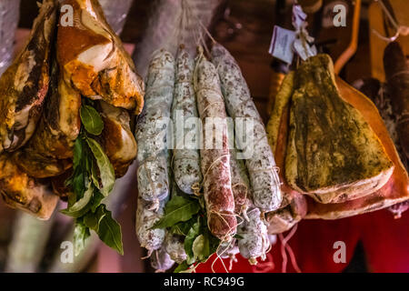 hanged meat for sale in Italian butcher Shop Stock Photo
