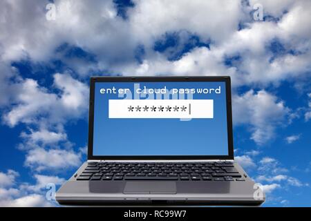 Laptop, lettering "enter cloud password", clouds, sky, symbolic image for cloud computing, cloud Stock Photo