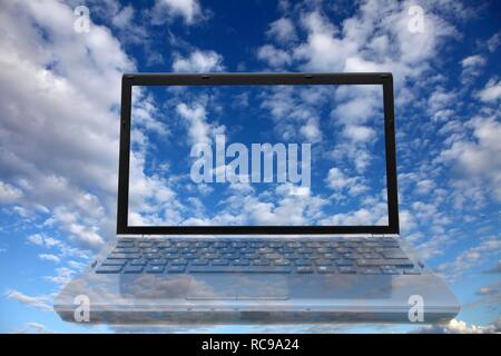 Laptop, clouds, sky, symbolic image for cloud computing, cloud Stock Photo