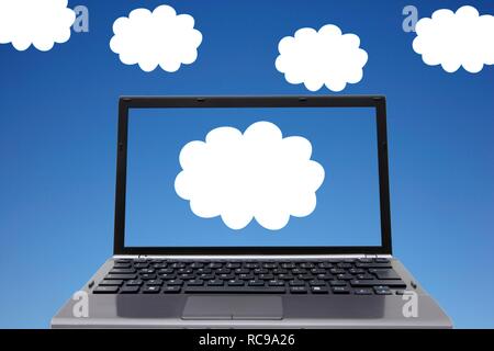 Laptop, clouds, sky, symbolic image for cloud computing, cloud Stock Photo