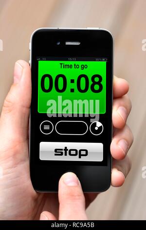 Iphone, smart phone, timer, alarm clock, stopwatch app on the screen Stock Photo