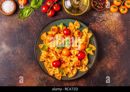 Pasta with meatballs and tomato sauce, top view, copy space. Stock Photo