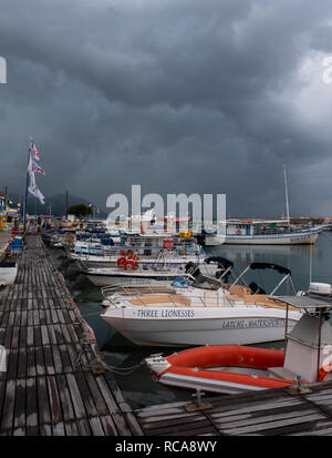 Storm clouds gather over Latchi harbour, Cyprus. Stock Photo