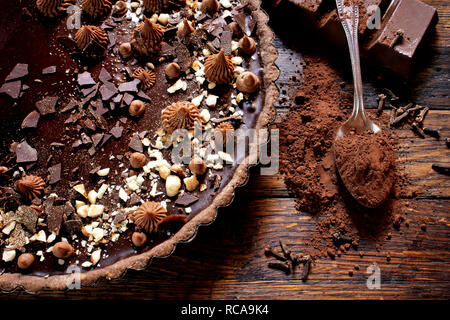 Chocolate tart on wooden background Stock Photo
