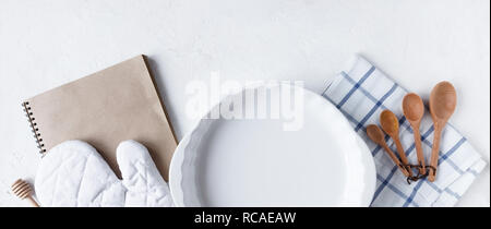 dishes and kitchen accessories for baking on the Kitchen table on a white background Copy space Banner Stock Photo