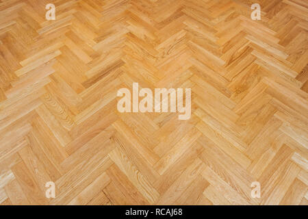 parquet floor background - heringbone parquet flooring Stock Photo