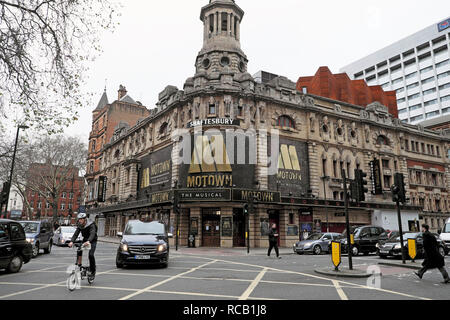 Shaftesbury Theatre featuring Motown the Musical on Shaftesbury Avenue and Brompton bicycle in traffic in London WC2 England UK    KATHY DEWITT Stock Photo