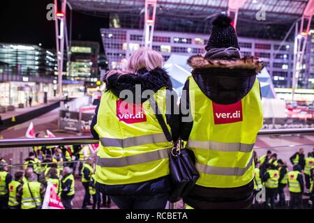 Munich, Bavaria, Germany. 15th Jan, 2019. Citing a breakdown in talks with employers on December 21st, the German Ver.di union organized the latest warning strike in a series at the Munich International Airport with members employed in Airport Security Services (Luftsicherheit) walking out from 3:30am to 24:00. The union is demanding 20 Euros per hour for their 1,000 total members working in Passenger-, Freight, Personnel, and Goods Control of Airport Security, along with recertification to bring other members to the same level. They are also requesting other members receive 'substanti Stock Photo