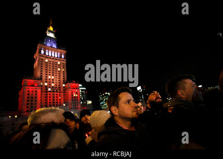 (190115) -- WARSAW, Jan. 15, 2019 (Xinhua) -- Mayor of Warsaw Rafal Trzaskowski (C) joins in a march in commemoration of Pawel Adamowicz, the late Mayor of the Polish port city of Gdansk, in center of Warsaw, Poland, Jan. 14, 2018. The UN refugee agency, UNHCR, said Monday it is 'deeply shocked and saddened' to hear that Pawel Adamowicz has died after being stabbed at a charity event. Adamowicz launched the Gdansk 'Immigrant Integration Model' in 2016, a model that has inspired other Polish cities, said the UN agency. The agency wrote in February 2018 that the Gdansk Model is a com Stock Photo