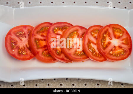 Sliced red tomatoes. Stock Photo