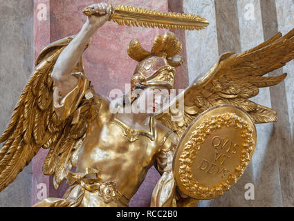 PRAGUE, CZECH REPUBLIC - OCTOBER 18, 2018: The carved polychrome statue of Archangel Michael in church Kostel Svaté Kateřiny Alexandrijské Stock Photo