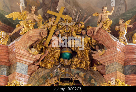 PRAGUE, CZECH REPUBLIC - OCTOBER 18, 2018: The baroque sculptural group of Holy Trinity in church Kostel Svaté Kateřiny Alexandrijské Stock Photo