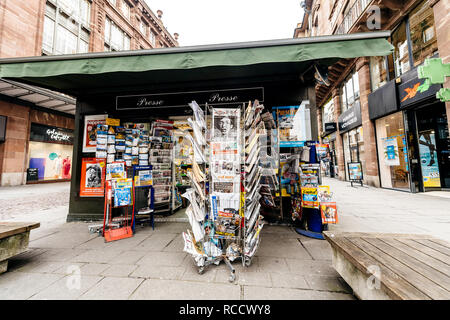 PARIS, FRANCE - MAR 15, 2018: International newspapes stack with portrait of Stephen Hawking the English theoretical physicist, cosmologist dead on 14 March 2018 on sale in Paris kisok Stock Photo