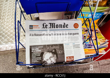 PARIS, FRANCE - MAR 15, 2018: International newspaper Le Monde with portrait of Stephen Hawking the English theoretical physicist, cosmologist dead on 14 March 2018 Stock Photo