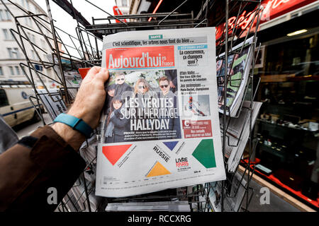 PARIS, FRANCE - MAR 15, 2018: French Aujourd'hui magazine with portrait of French singer Johnny Hallyday during the money dispute scandal   Stock Photo