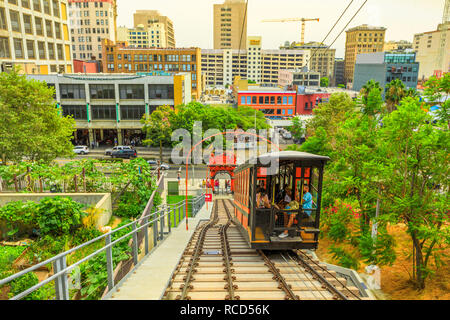 Los Angeles, California, United States - August 9, 2018: tourists take famous Angels Flight, at the funicular railway on Hill Street, Bunker Hill of LA Downtown. Los Angeles Historic-Cultural Monument Stock Photo