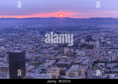 Aerial view of Los Angeles skyline at panoramic terrace of Oue Skyspace in California, United States with Hollywood Hills on background. Downtown of LA cityscape from observation deck on 70th floor. Stock Photo