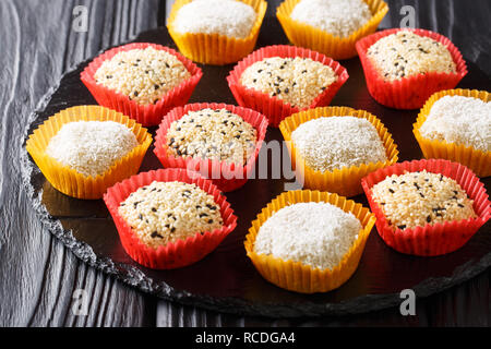 Sweet Japanese Mochi Ice Cream in Many Flavours close-up on the table. horizontal Stock Photo