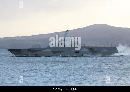 HSwMS Visby (K31), a Visby-class corvette operated by the Swedish Royal Navy, passing Greenock at the start of Exercise Joint Warrior 13-1. Stock Photo