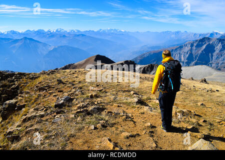 Woman hiking on the 3000m high Torrenthorn, Switzerland/Europe Stock Photo