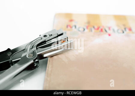 Portrait of diary with stapler. Isolated on the white background. Stock Photo