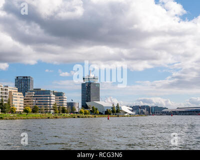 Apartment buildings, Eye film museum and Adam Tower on northern bank of IJ river in Amsterdam, Netherlands Stock Photo