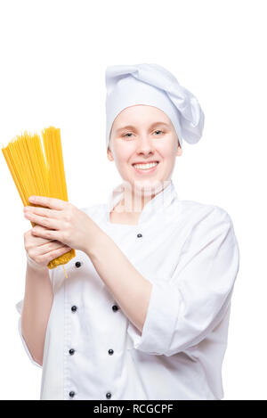 vertical portrait of a cook with spaghetti on a white background in the studio isolated Stock Photo