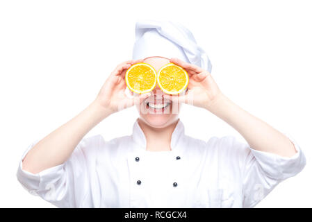 cheerful portrait of a chef with oranges on white background isolated Stock Photo