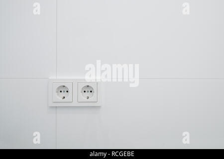 socket,  electric plug outlets on white tiles Stock Photo