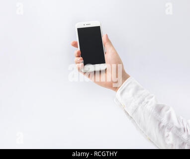Male hand holding smartphone,mobile on white background.business and technology concepts ideas Stock Photo
