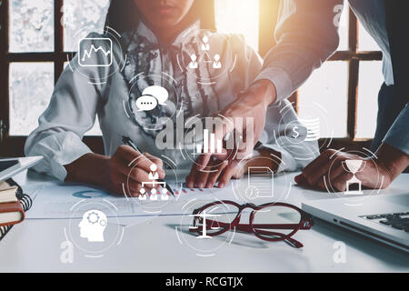 Business team analyzing income charts and graphs with modern laptop computer. Close up.Business analysis and strategy concept. Stock Photo