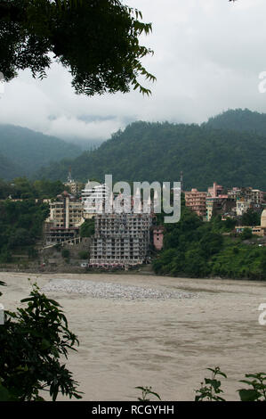 Rishikesh / India - August 2011: View on Rishikesh with the Ganges. Stock Photo