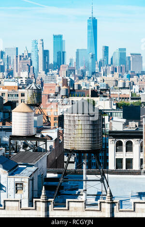 High angle view of the skyline of Manhattan in New York City a sunny day. Water tank on foreground Stock Photo