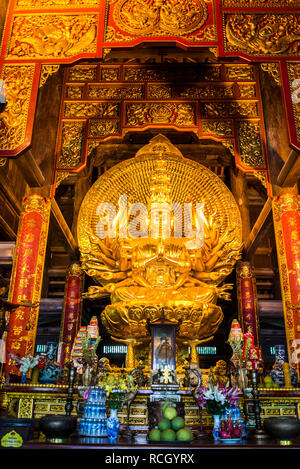 Bai Dinh Buddhist Temple, Altar with Buddha statue, Ninh Bình Province, Vietnam Stock Photo
